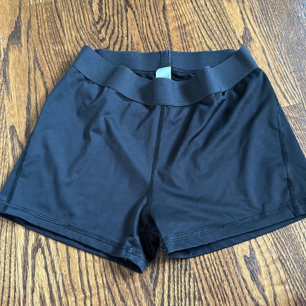 Victoria Sport elastic waist stretch workout shorts. Medium. Form fitting.